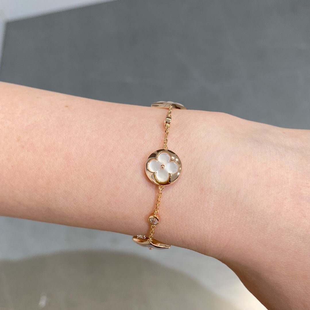 [LumiVibe]STAR AND SUN 4 MOTIF WHITE MOP PINK GOLD BRACELET